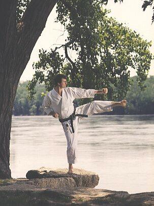 Joe performing a side snap kick Shotokan Karate
